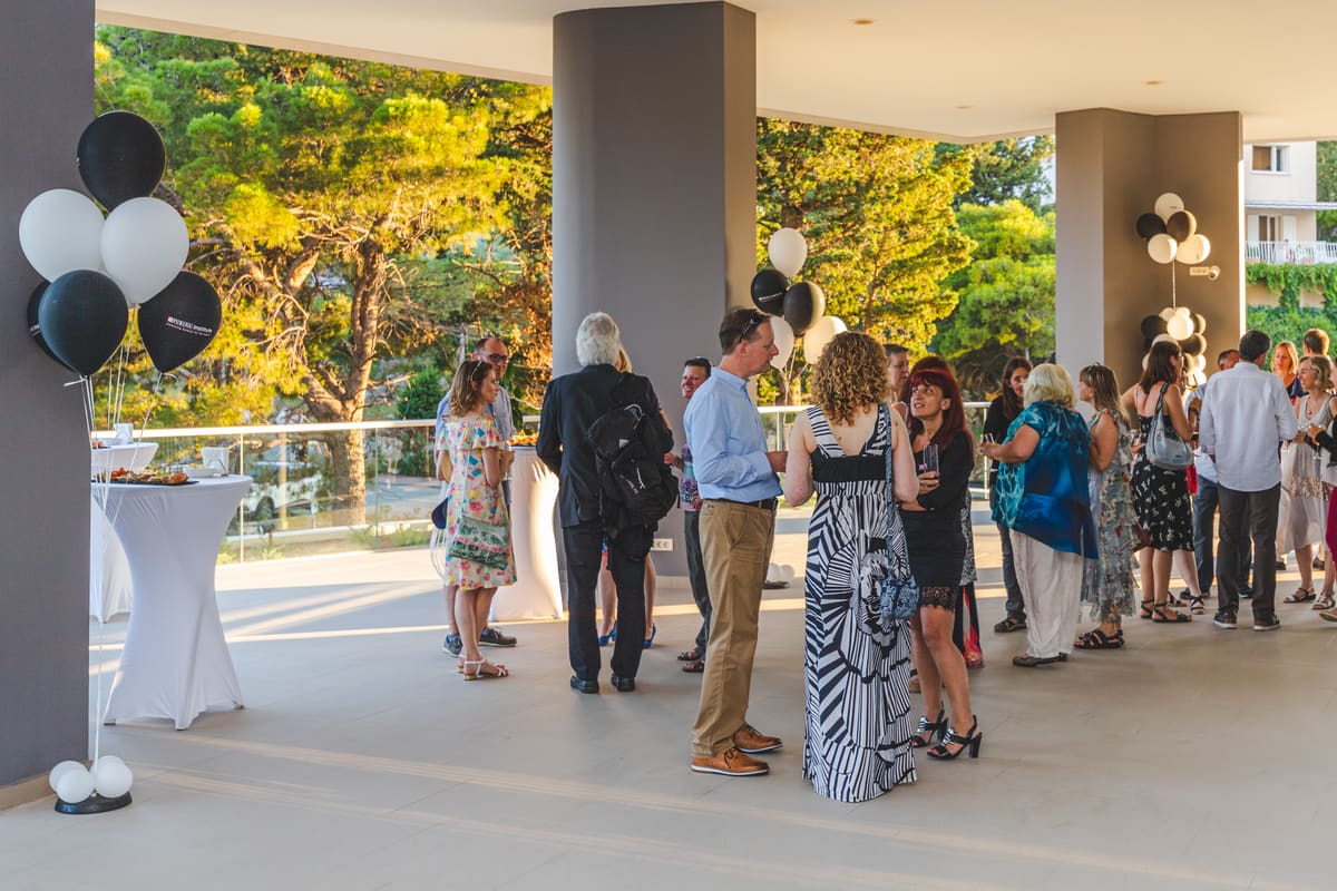 Guests at an outdoor welcome reception at the Purina corporate event 2019