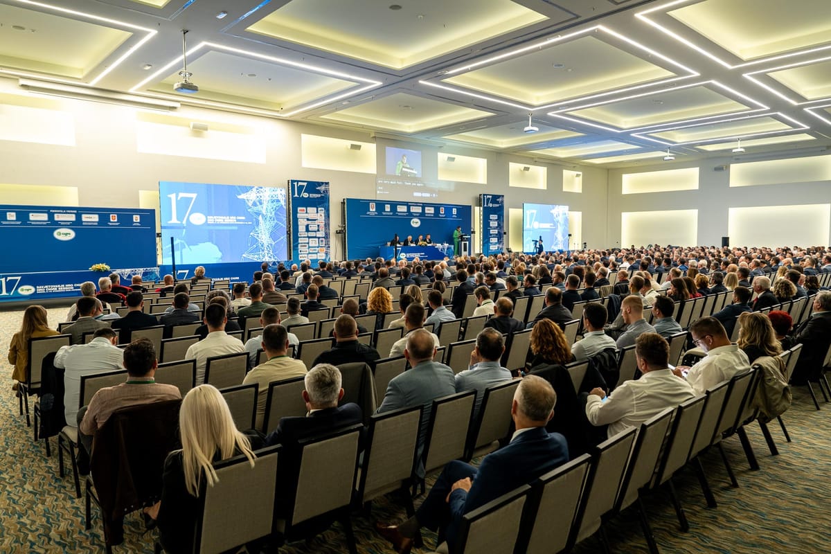 Delegates seated in a full plenary hall at a congress organised by Adria Congress